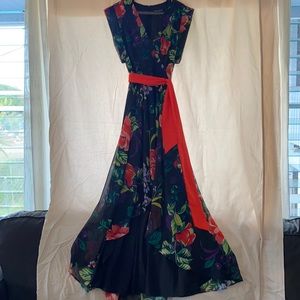 I.N.C. Long floral dress. Size 10. Tie around waist. Vibrant floral design.